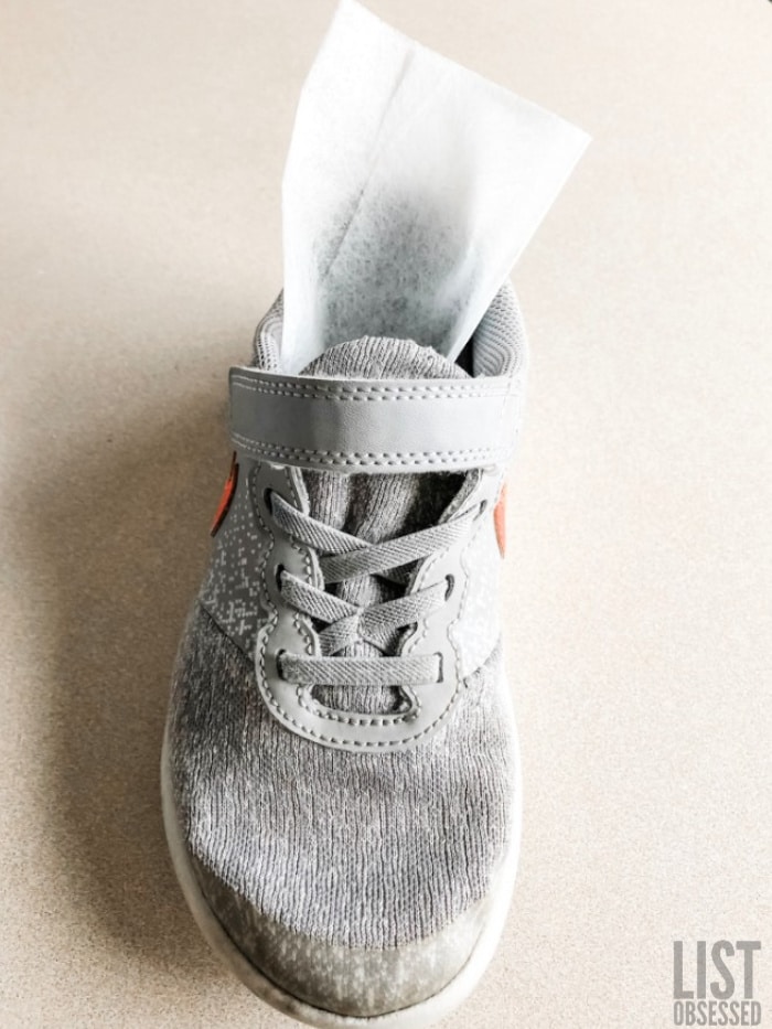 use dryer sheets to freshen up stinky shoes