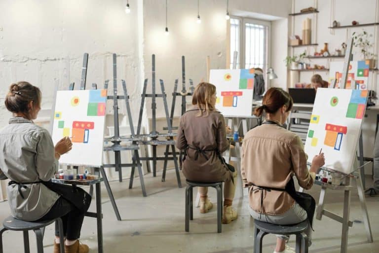 adults in an art class learning about abstract art